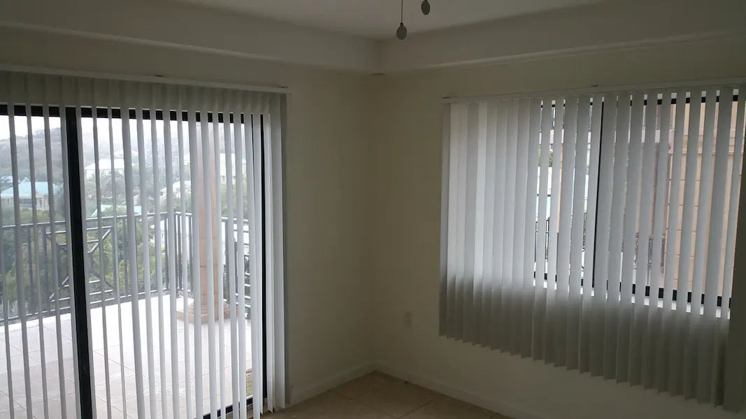 Bedroom opening to a private patio
