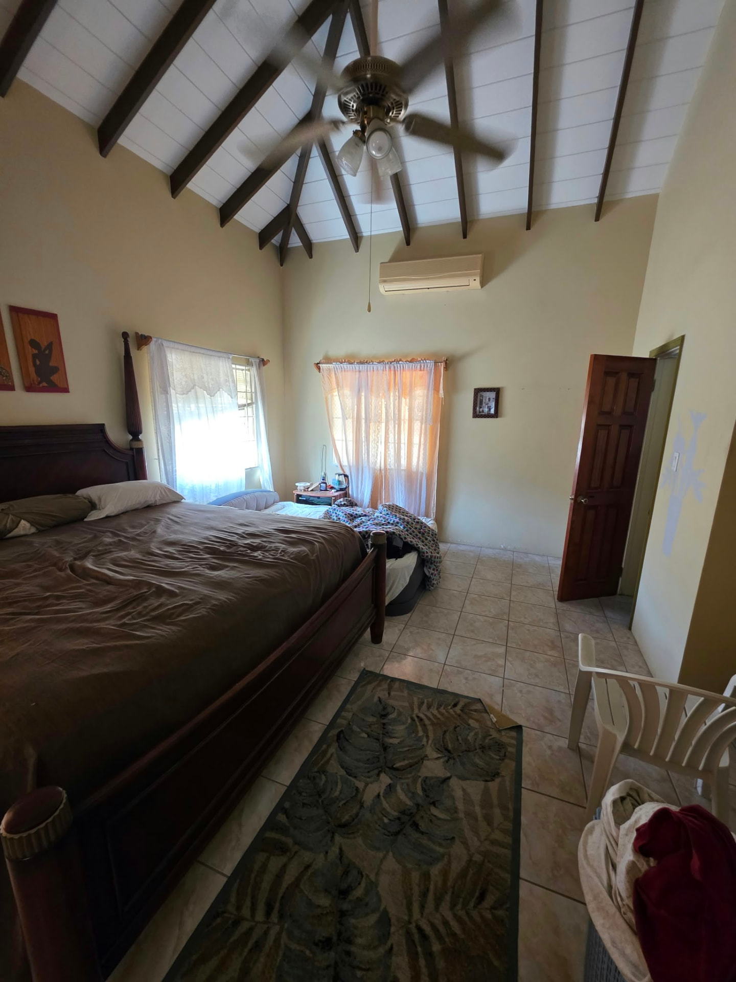 Bedroom with vaulted ceiling