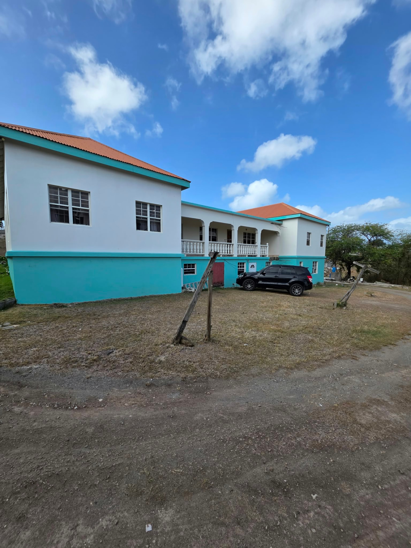 Driveway and grounds of the one-acre lot