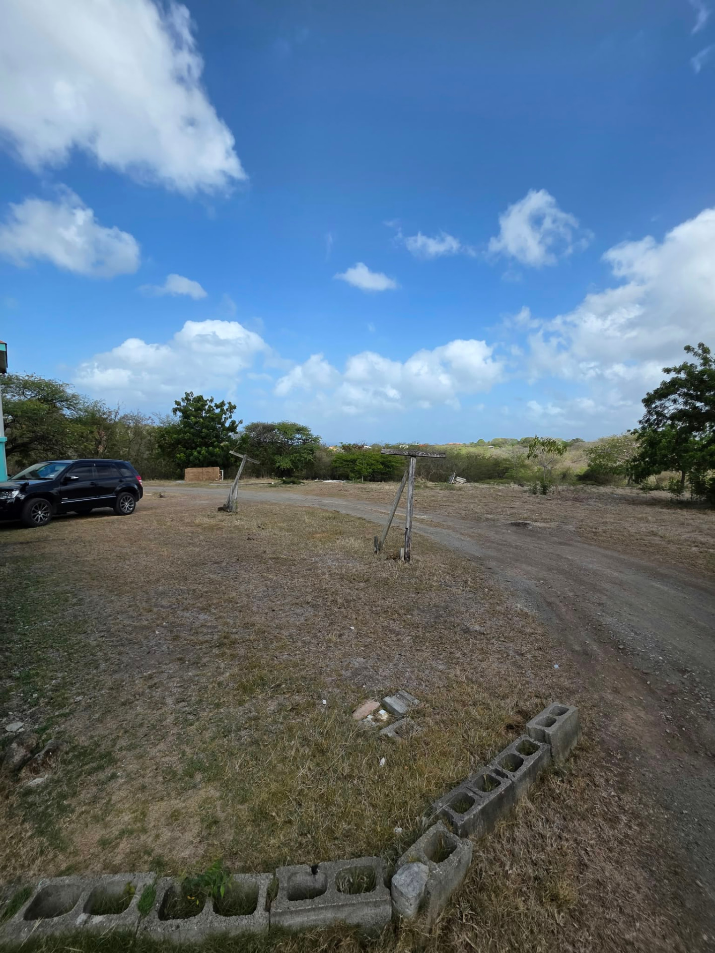 Open yard with countryside and sea views
